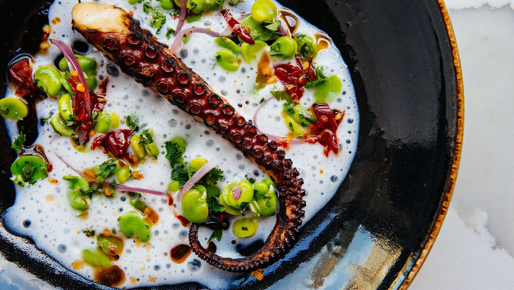 black plate with octopus
