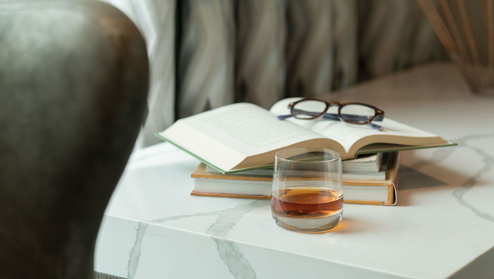 whiskey and glasses on a table