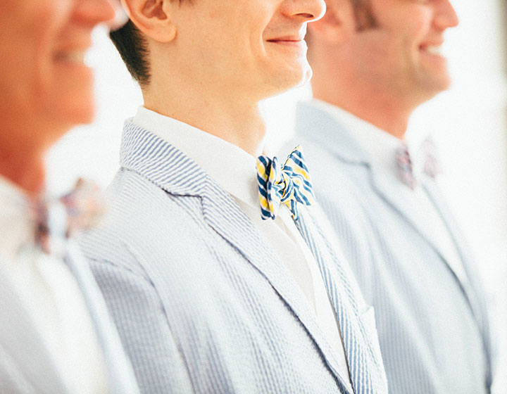 man smiling in bow tie